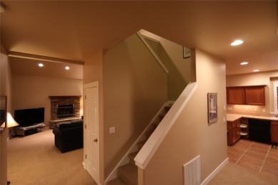 Vaulted ceilings and inspired, open floorplan 4 bedroom 3 full on Eagle Bend Golf Course in Montana - for sale on GolfHomes.com, golf home, golf lot