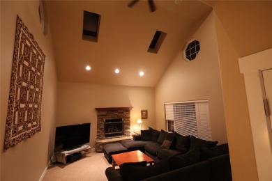 Vaulted ceilings and inspired, open floorplan 4 bedroom 3 full on Eagle Bend Golf Course in Montana - for sale on GolfHomes.com, golf home, golf lot