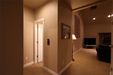 Vaulted ceilings and inspired, open floorplan 4 bedroom 3 full on Eagle Bend Golf Course in Montana - for sale on GolfHomes.com, golf home, golf lot