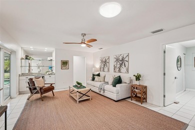 Tasteful three bedroom, two bath residence with heated private on The Meadows Golf and Country Club in Florida - for sale on GolfHomes.com, golf home, golf lot