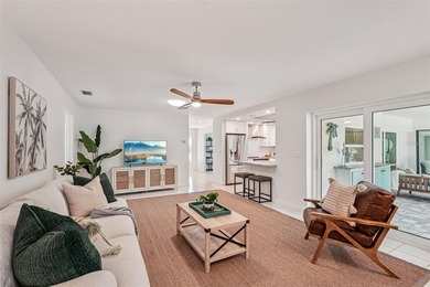 Tasteful three bedroom, two bath residence with heated private on The Meadows Golf and Country Club in Florida - for sale on GolfHomes.com, golf home, golf lot