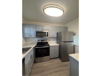 This beautifully renovated 2nd-floor condo in the desirable on Quail Run Golf Club In Naples in Florida - for sale on GolfHomes.com, golf home, golf lot