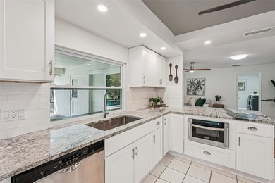 Tasteful three bedroom, two bath residence with heated private on The Meadows Golf and Country Club in Florida - for sale on GolfHomes.com, golf home, golf lot