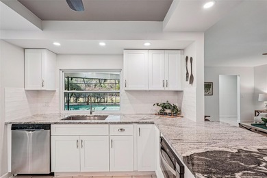 Tasteful three bedroom, two bath residence with heated private on The Meadows Golf and Country Club in Florida - for sale on GolfHomes.com, golf home, golf lot