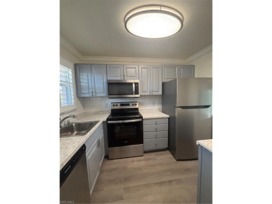 This beautifully renovated 2nd-floor condo in the desirable on Quail Run Golf Club In Naples in Florida - for sale on GolfHomes.com, golf home, golf lot