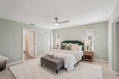 Tasteful three bedroom, two bath residence with heated private on The Meadows Golf and Country Club in Florida - for sale on GolfHomes.com, golf home, golf lot