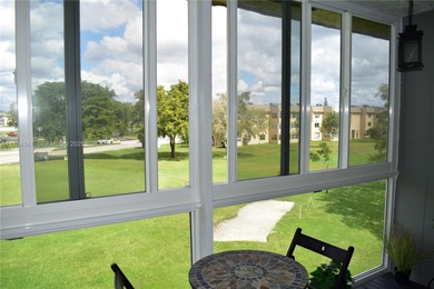 Enjoy watching the golfers on the 3rd hole or participate in the on Sunrise Lakes Phase IV Golf Course in Florida - for sale on GolfHomes.com, golf home, golf lot