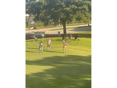 Enjoy watching the golfers on the 3rd hole or participate in the on Sunrise Lakes Phase IV Golf Course in Florida - for sale on GolfHomes.com, golf home, golf lot