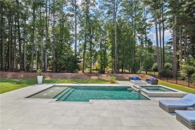 Welcome to 6645 Polo Dr! Situated on the 7th green of the on Polo Golf and Country Club in Georgia - for sale on GolfHomes.com, golf home, golf lot