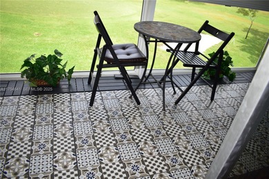 Enjoy watching the golfers on the 3rd hole or participate in the on Sunrise Lakes Phase IV Golf Course in Florida - for sale on GolfHomes.com, golf home, golf lot