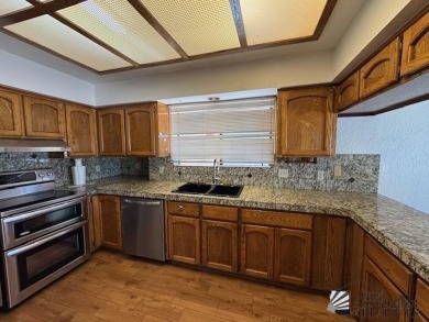 Move in ready 3-bedroom 1 full bath, 1 3/4 bath, back yard gate on Mesa Del Sol Golf Club in Arizona - for sale on GolfHomes.com, golf home, golf lot