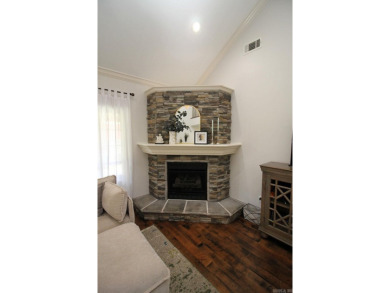 Spacious and elegant 5-bedroom, 3-bath home situated on a on Paragould Country Club in Arkansas - for sale on GolfHomes.com, golf home, golf lot