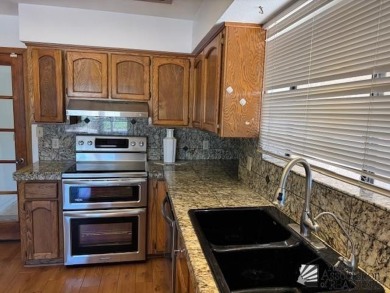 Move in ready 3-bedroom 1 full bath, 1 3/4 bath, back yard gate on Mesa Del Sol Golf Club in Arizona - for sale on GolfHomes.com, golf home, golf lot