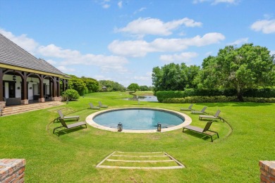 A European-inspired estate nestled within the prestigious on Palm Beach Polo and Country Club in Florida - for sale on GolfHomes.com, golf home, golf lot