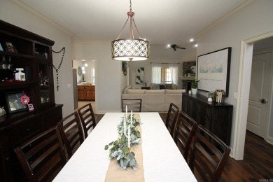 Spacious and elegant 5-bedroom, 3-bath home situated on a on Paragould Country Club in Arkansas - for sale on GolfHomes.com, golf home, golf lot