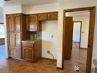Move in ready 3-bedroom 1 full bath, 1 3/4 bath, back yard gate on Mesa Del Sol Golf Club in Arizona - for sale on GolfHomes.com, golf home, golf lot