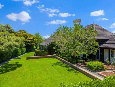 A European-inspired estate nestled within the prestigious on Palm Beach Polo and Country Club in Florida - for sale on GolfHomes.com, golf home, golf lot