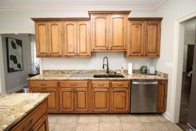 Spacious and elegant 5-bedroom, 3-bath home situated on a on Paragould Country Club in Arkansas - for sale on GolfHomes.com, golf home, golf lot