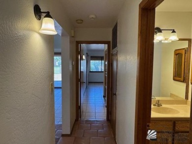 Move in ready 3-bedroom 1 full bath, 1 3/4 bath, back yard gate on Mesa Del Sol Golf Club in Arizona - for sale on GolfHomes.com, golf home, golf lot