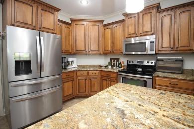 Spacious and elegant 5-bedroom, 3-bath home situated on a on Paragould Country Club in Arkansas - for sale on GolfHomes.com, golf home, golf lot