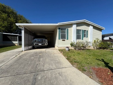 Looking for the perfect getaway in sunny Florida? Look no on Lake Henry Golf Club in Florida - for sale on GolfHomes.com, golf home, golf lot