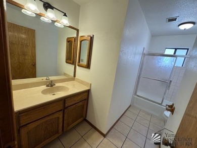 Move in ready 3-bedroom 1 full bath, 1 3/4 bath, back yard gate on Mesa Del Sol Golf Club in Arizona - for sale on GolfHomes.com, golf home, golf lot
