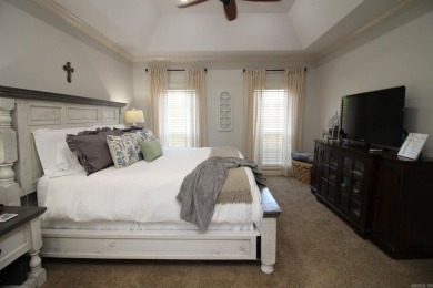 Spacious and elegant 5-bedroom, 3-bath home situated on a on Paragould Country Club in Arkansas - for sale on GolfHomes.com, golf home, golf lot