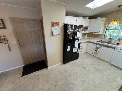 Looking for the perfect getaway in sunny Florida? Look no on Lake Henry Golf Club in Florida - for sale on GolfHomes.com, golf home, golf lot