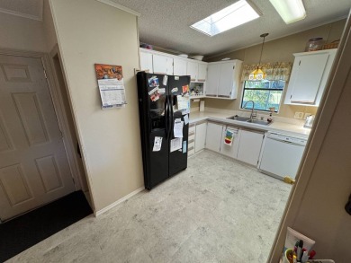 Looking for the perfect getaway in sunny Florida? Look no on Lake Henry Golf Club in Florida - for sale on GolfHomes.com, golf home, golf lot