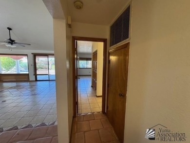 Move in ready 3-bedroom 1 full bath, 1 3/4 bath, back yard gate on Mesa Del Sol Golf Club in Arizona - for sale on GolfHomes.com, golf home, golf lot