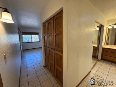 Move in ready 3-bedroom 1 full bath, 1 3/4 bath, back yard gate on Mesa Del Sol Golf Club in Arizona - for sale on GolfHomes.com, golf home, golf lot