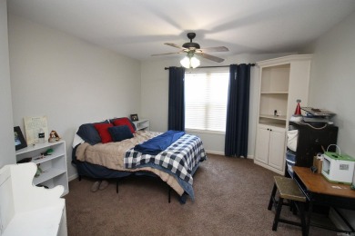Spacious and elegant 5-bedroom, 3-bath home situated on a on Paragould Country Club in Arkansas - for sale on GolfHomes.com, golf home, golf lot