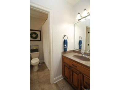 Spacious and elegant 5-bedroom, 3-bath home situated on a on Paragould Country Club in Arkansas - for sale on GolfHomes.com, golf home, golf lot