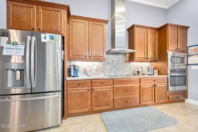 Stunning 4-Bedroom Plus Office in Plantation Bay! Located in the on Plantation Bay Golf and Country Club in Florida - for sale on GolfHomes.com, golf home, golf lot