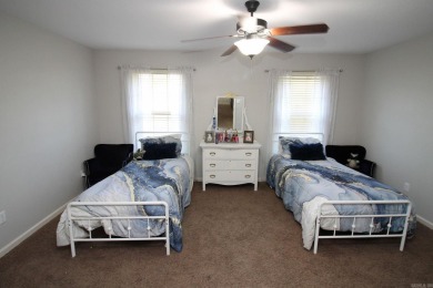 Spacious and elegant 5-bedroom, 3-bath home situated on a on Paragould Country Club in Arkansas - for sale on GolfHomes.com, golf home, golf lot