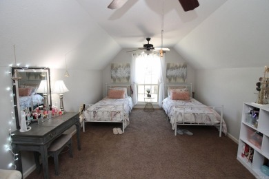Spacious and elegant 5-bedroom, 3-bath home situated on a on Paragould Country Club in Arkansas - for sale on GolfHomes.com, golf home, golf lot