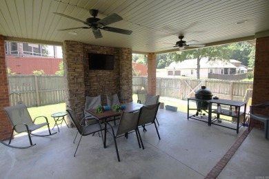 Spacious and elegant 5-bedroom, 3-bath home situated on a on Paragould Country Club in Arkansas - for sale on GolfHomes.com, golf home, golf lot