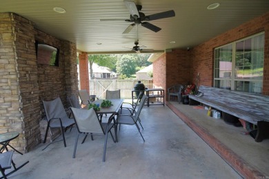 Spacious and elegant 5-bedroom, 3-bath home situated on a on Paragould Country Club in Arkansas - for sale on GolfHomes.com, golf home, golf lot