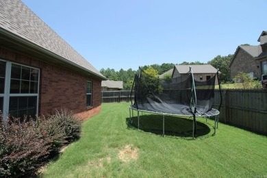 Spacious and elegant 5-bedroom, 3-bath home situated on a on Paragould Country Club in Arkansas - for sale on GolfHomes.com, golf home, golf lot
