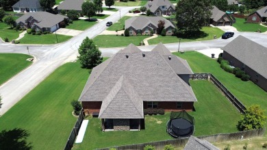 Spacious and elegant 5-bedroom, 3-bath home situated on a on Paragould Country Club in Arkansas - for sale on GolfHomes.com, golf home, golf lot