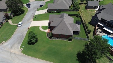 Spacious and elegant 5-bedroom, 3-bath home situated on a on Paragould Country Club in Arkansas - for sale on GolfHomes.com, golf home, golf lot