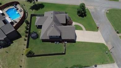 Spacious and elegant 5-bedroom, 3-bath home situated on a on Paragould Country Club in Arkansas - for sale on GolfHomes.com, golf home, golf lot