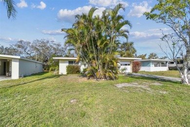 Located in the highly sought-after waterfront community of on The Dunedin Country Club in Florida - for sale on GolfHomes.com, golf home, golf lot