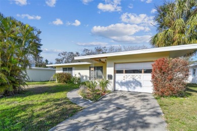 Located in the highly sought-after waterfront community of on The Dunedin Country Club in Florida - for sale on GolfHomes.com, golf home, golf lot