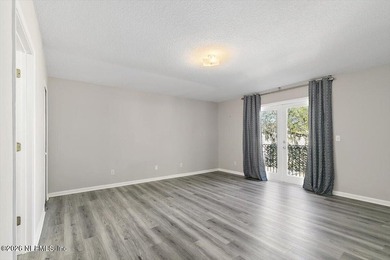 Welcome to 37 Jardin De Mer, a light-filled 2nd-floor condo on Jacksonville Beach Golf Course in Florida - for sale on GolfHomes.com, golf home, golf lot