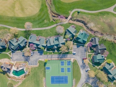 Enjoy this beautifully updated cottage at one of the best golf on The Club At Old Kinderhook in Missouri - for sale on GolfHomes.com, golf home, golf lot