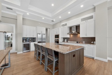 Discover a truly stunning Arthur Rutenberg home in the esteemed on Grasslands Golf and Country Club in Florida - for sale on GolfHomes.com, golf home, golf lot