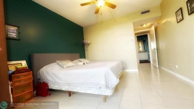 Exclusive 2 Bed/2 Bath Condo; Immerse yourself in tranquility on Inverrary Country Club in Florida - for sale on GolfHomes.com, golf home, golf lot
