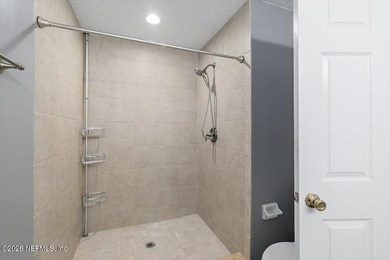 Welcome to 37 Jardin De Mer, a light-filled 2nd-floor condo on Jacksonville Beach Golf Course in Florida - for sale on GolfHomes.com, golf home, golf lot