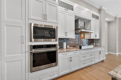 Discover a truly stunning Arthur Rutenberg home in the esteemed on Grasslands Golf and Country Club in Florida - for sale on GolfHomes.com, golf home, golf lot
